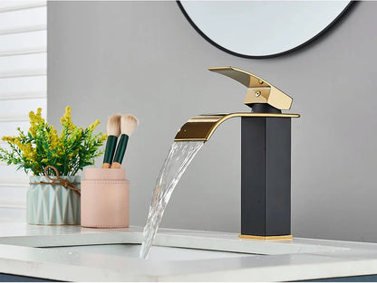 Modern bathroom sink faucet brass deck mount with sleek black and gold stainless steel waterfall curved spout design