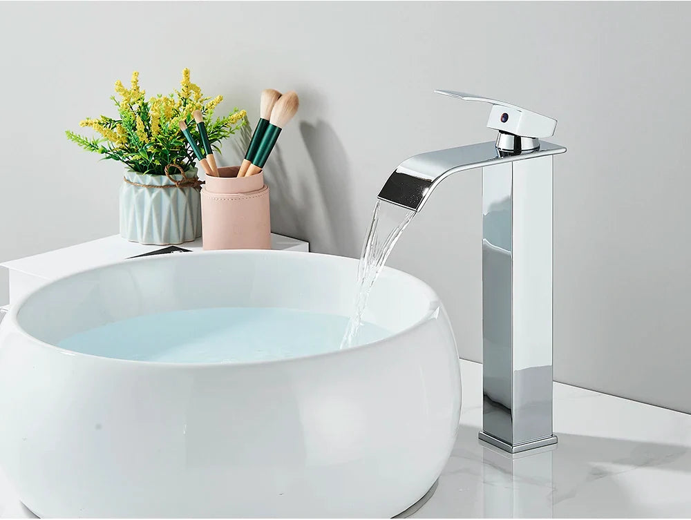 Modern chrome brass deck mount bathroom sink faucet with stainless steel waterfall spout and single handle design
