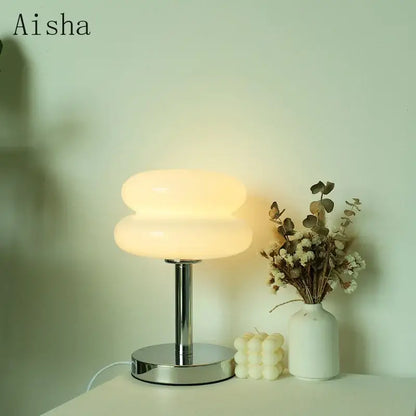 Aisha bauhaus glass table lamp with a sleek chrome base and two stacked off-white glass shades for bedroom light