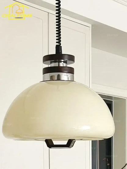Bauhaus cream glass pendant light with dome shape black coiled cord and metallic accents ideal for kitchen decorbites pendant lights