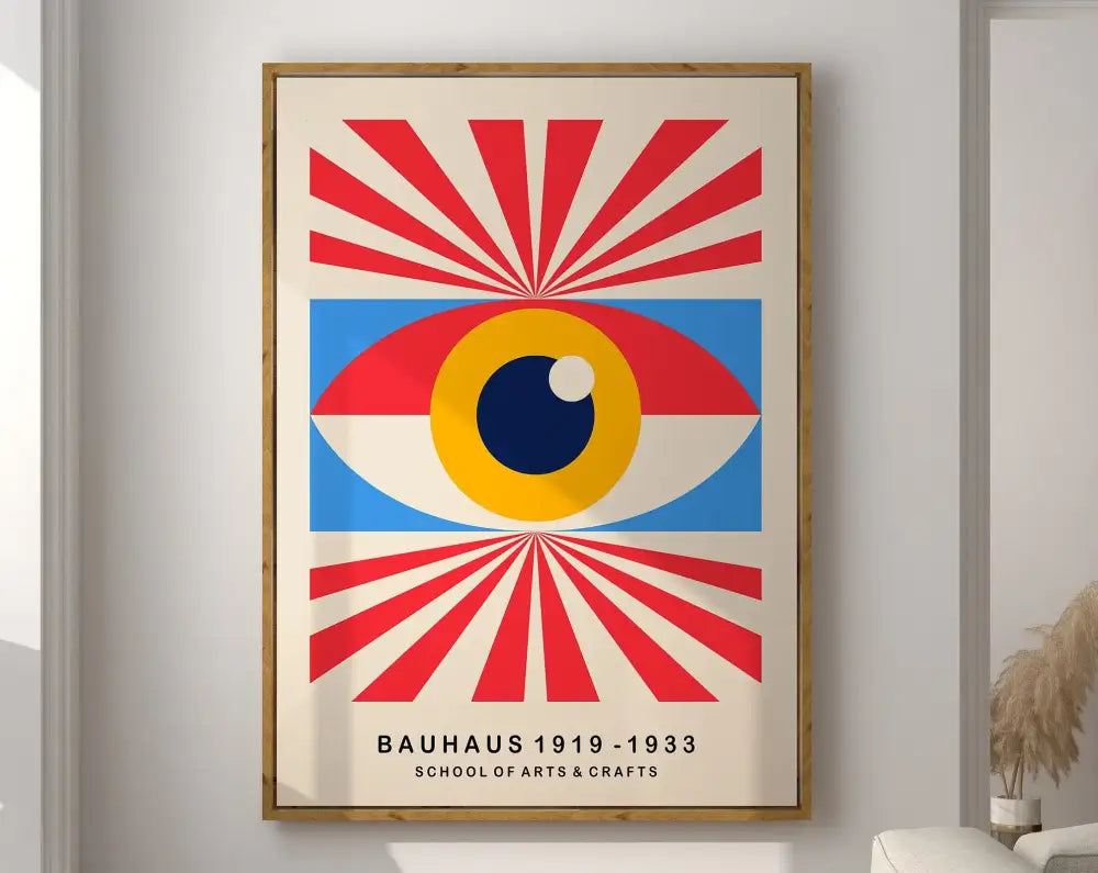 A framed DecorBites™ bauhaus geometric canvas print featuring a bold eye with red and blue rays on off-white background