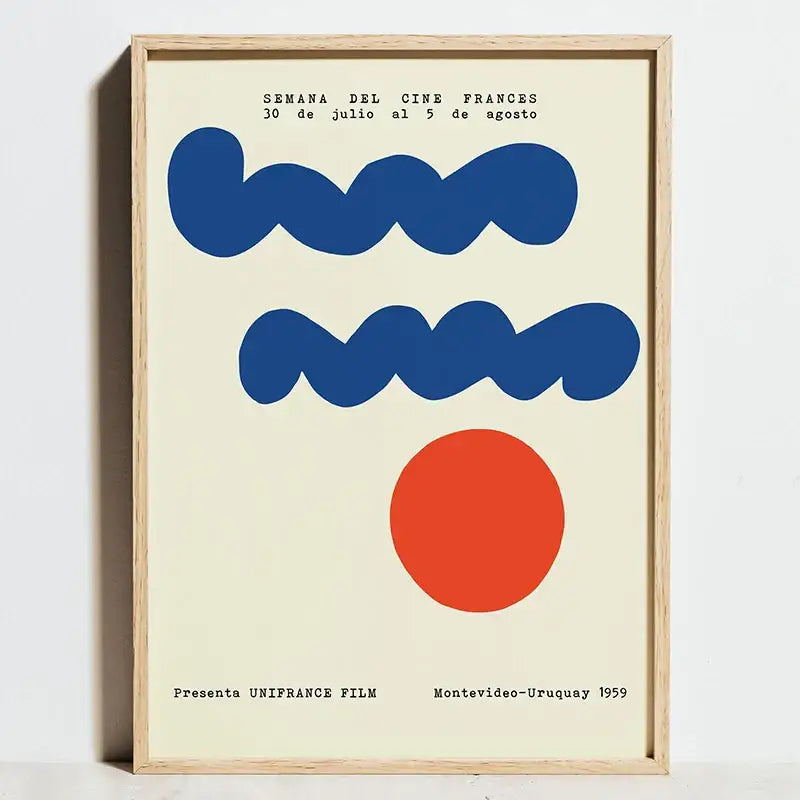 A framed decorbites bauhaus geometric exhibition poster featuring bold blue waves and a red circle on canvas