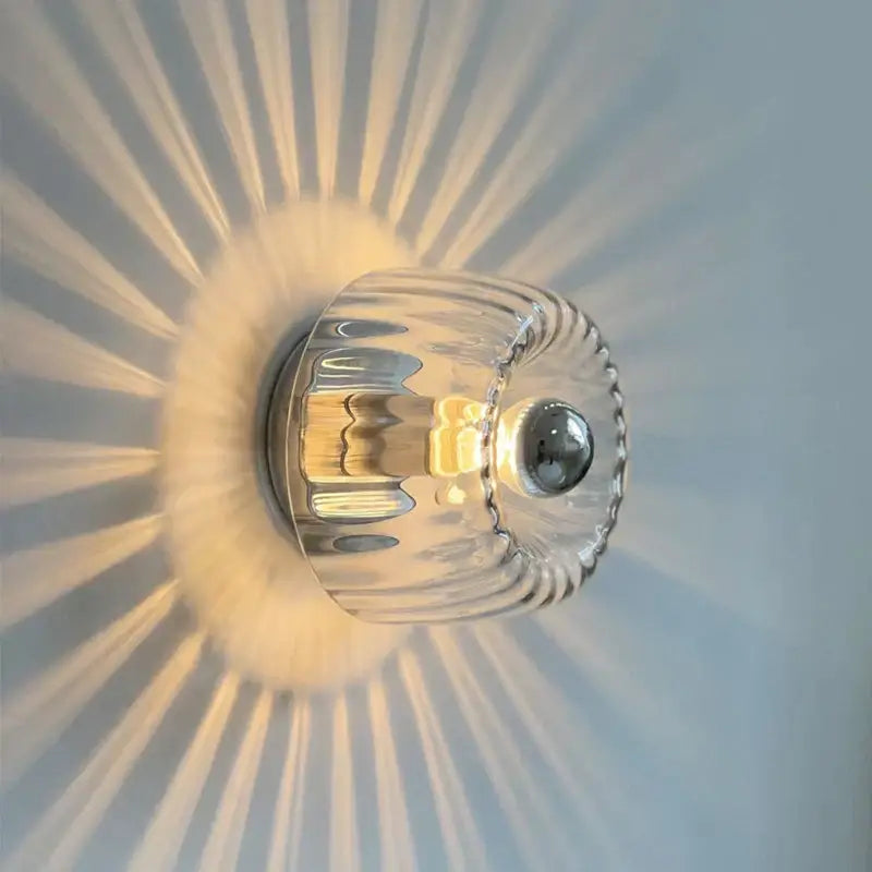 Clear glass bauhaus glass e14 wall lamp with ribbed faceted sconce and polished chrome base for living room use