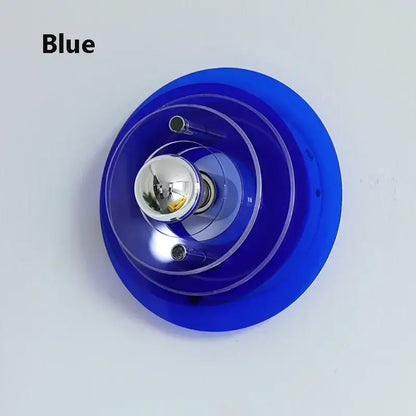 Blue translucent acrylic wall sconce with chrome bulb holder featured in bauhaus green and clear glass led wall sconces decorbites led wall