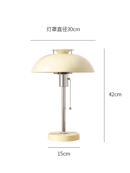 Cream-colored dome lampshade with chrome stem and base bauhaus led table lamp in glossy red for bedroom use