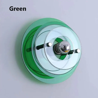 Green translucent glass bauhaus led wall sconce with concentric rings and chrome bulb holder for living room lighting
