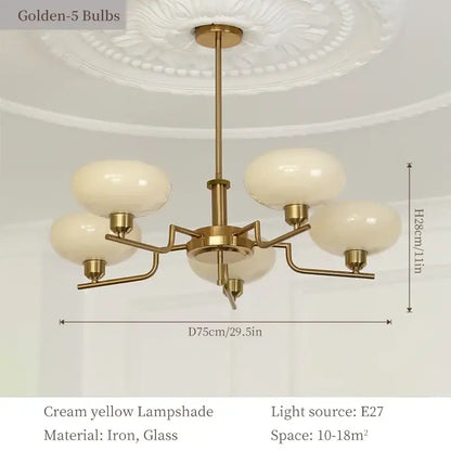 Brass-finished bauhaus medieval chandelier with five cream yellow glass lampshades for living room lighting