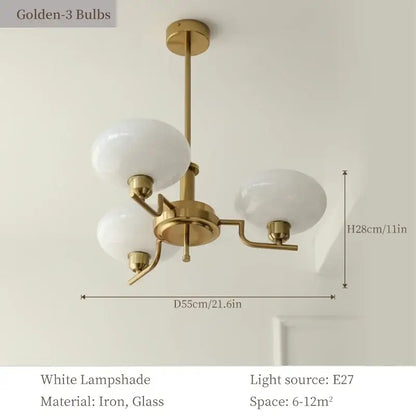 A modern bauhaus medieval chandelier with brass finish and three white glass lampshades for living room lighting