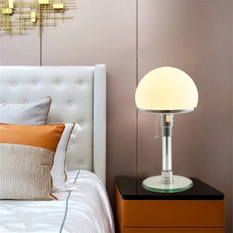 Bauhaus mushroom table lamp with frosted white glass dome shade and polished chrome base for bedroom use