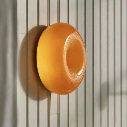 Orange translucent silicone soap dish with smooth rounded design for bauhaus orange glass table lamp use