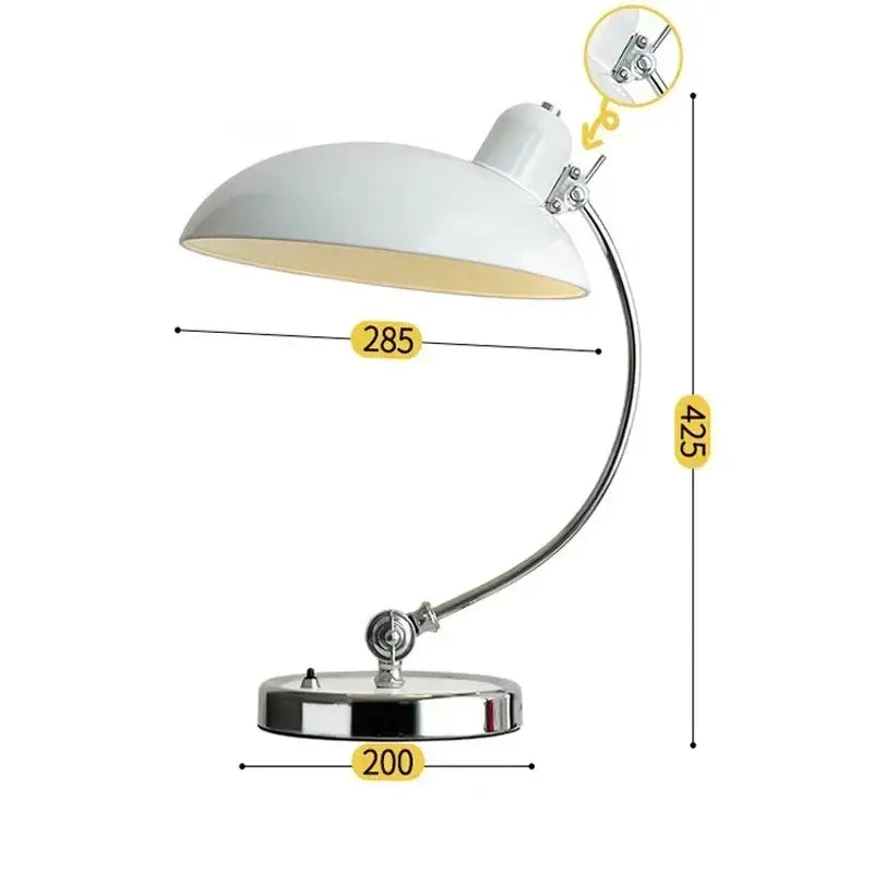 White enamel bauhaus vintage desk lamp with chrome finished base and articulated arm for office or bedroom use
