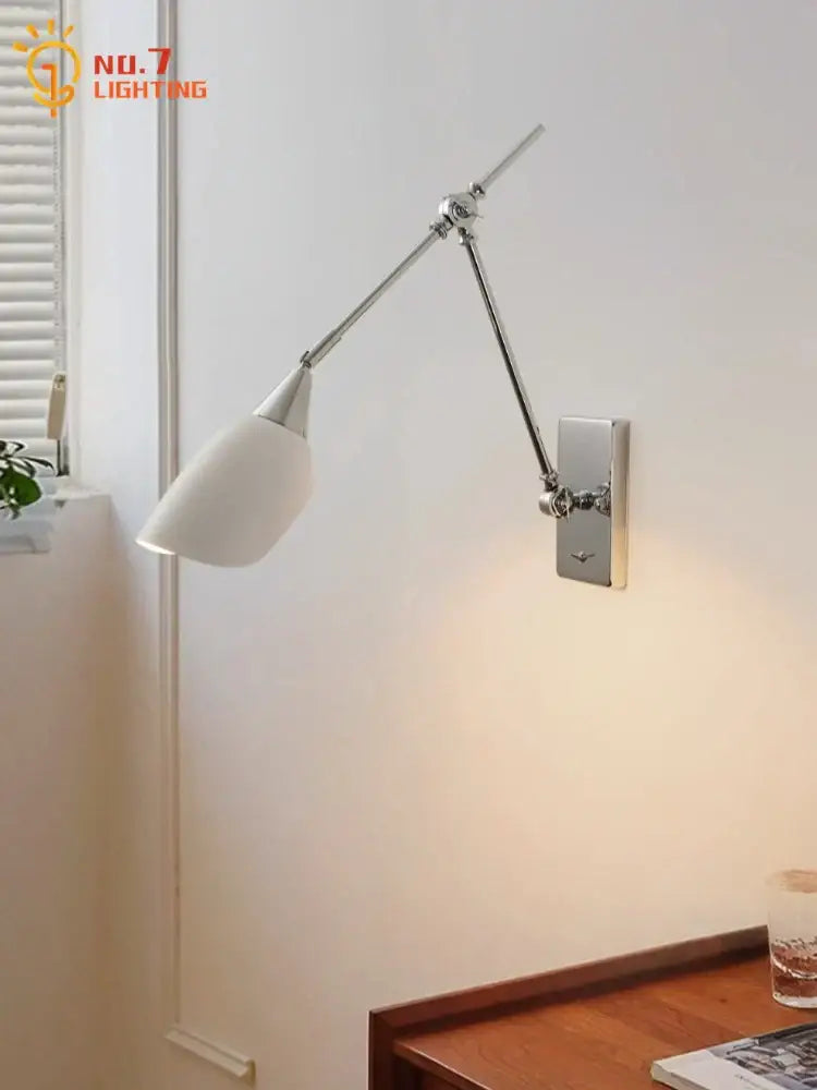 Chrome-finished bauhaus vintage swing arm wall lamp with white frosted glass shade for living room lighting