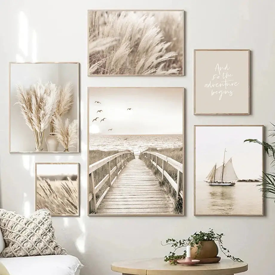 Set of six beige-toned framed beach landscape canvas wall art prints featuring coastal scenes and pampas grass decor