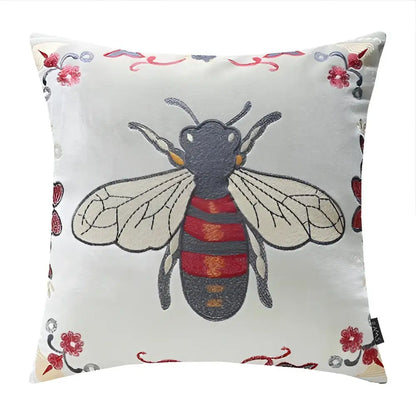 Square cushion cover with bee embroidery and floral motifs on light gray fabric for yellow green and blue living room decor