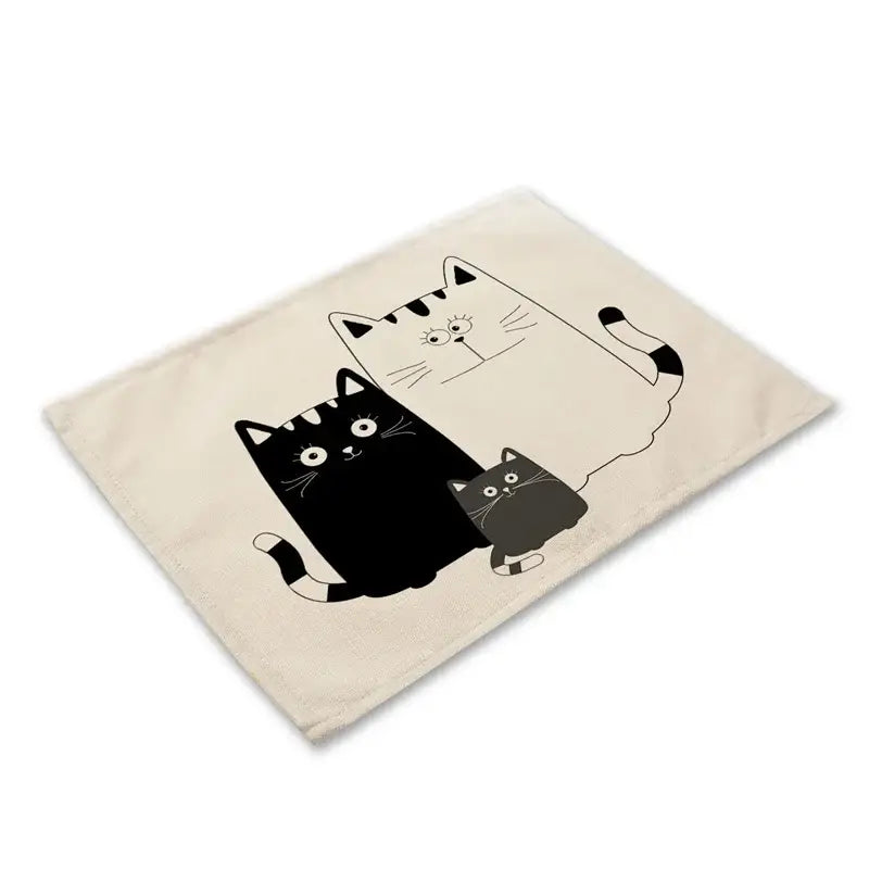 Cream-colored canvas cat linen placemat with black-and-white cartoon cats for dining room decorbites black cat set