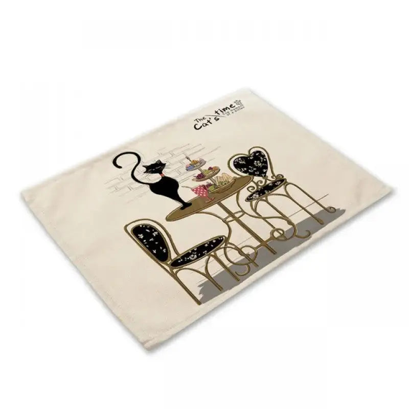 Beige and black cat linen placemat set featuring a cream cotton placemat with decorbites black cat and gold café table design