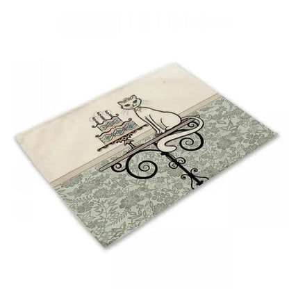 Beige black cat linen placemat featuring a white cat illustration on an ornate stand for dining room decorbites decor