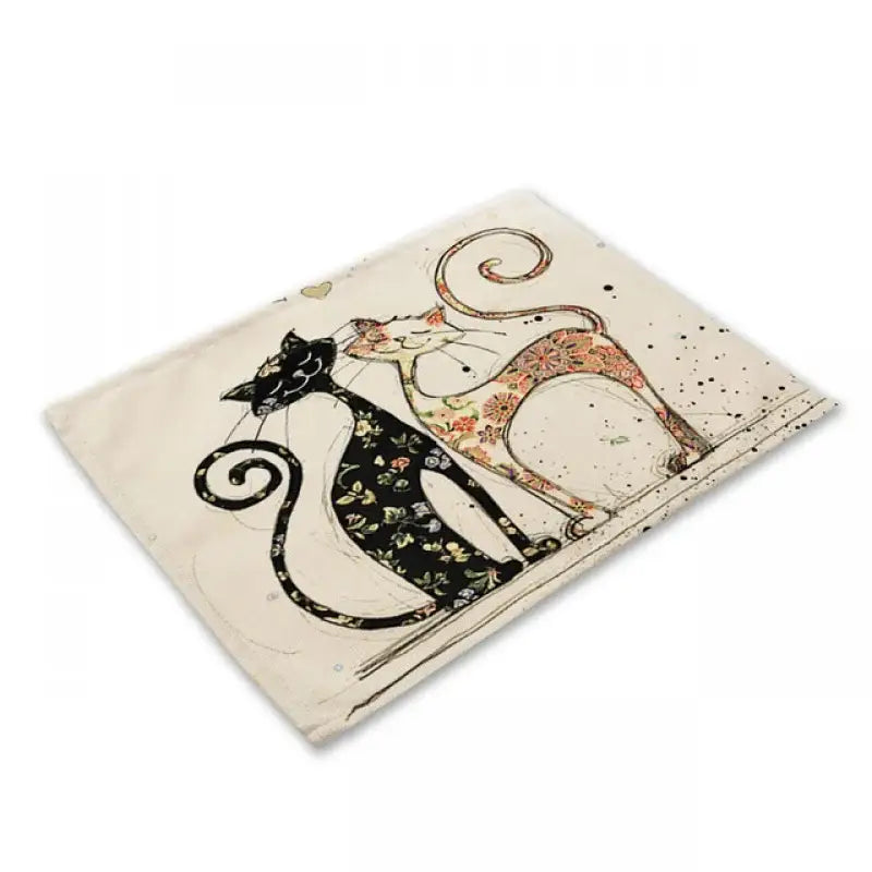 Cream-colored black cat linen placemat with beige and floral stylized cats for dining room table decorbites black cat