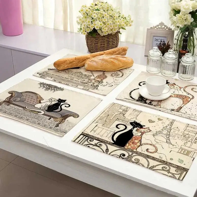 Set of four beige black cat linen placemats with vintage parisian scenes and ornate borders for dining room decorbites decor