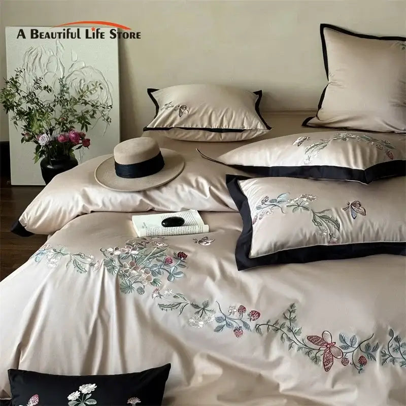 Beige satin bedding set with butterfly flowers embroidery and black piping made from decorbites 1000tc cotton
