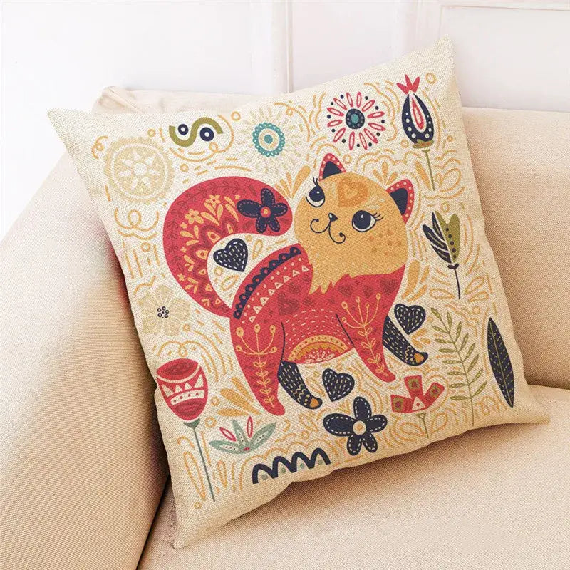 Beige cartoon cat linen pillowcase with colorful red and orange stylized cat and intricate floral decorbites cartoon cat design