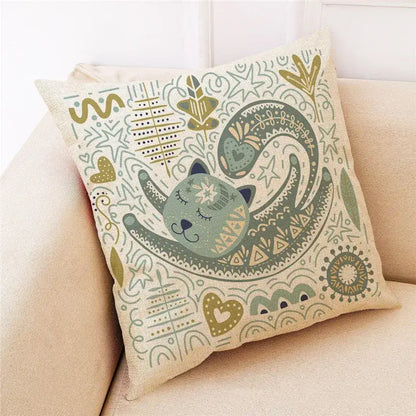 Beige linen throw pillow featuring a whimsical cartoon cat illustration in muted olive and teal for bedroom decorbites cartoon cat decor