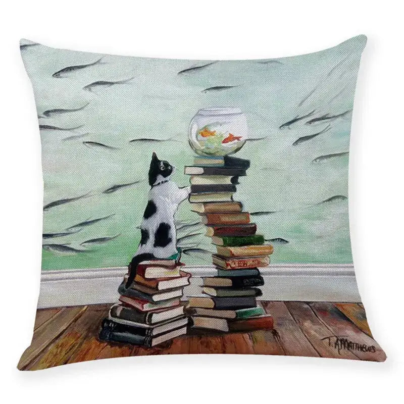 Beige cushion cover featuring a painted black and white cat reaching for a fishbowl on books pillow case 45x45cm decorbites creative cat
