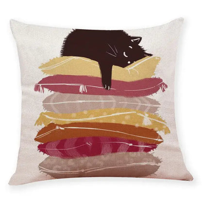 Square beige cushion cover 45x45cm featuring a black cat illustration atop colorful textured pillows by decorbites creative cat