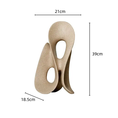 Beige ceramic coral hollow sculpture with flowing intertwined forms and smooth matte finish for living room decorbites coral hollow