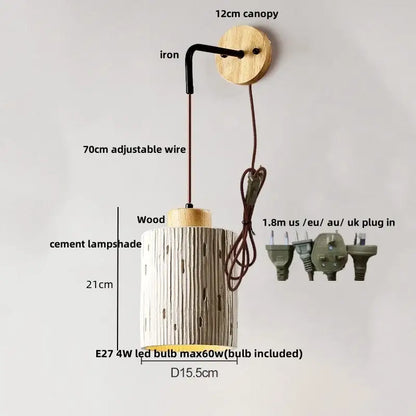 Beige ceramic cylindrical wall sconce with rustic wood accents and pull chain switch for bedroom lighting