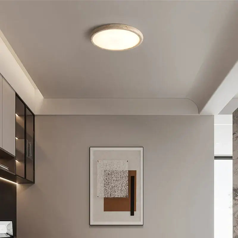 Beige concrete brass led flush mount ceiling lamp with circular recessed matte textured finish and soft diffused light