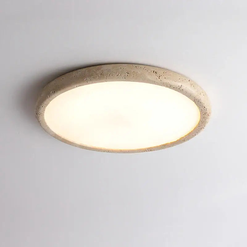 Beige concrete brass led flush mount ceiling lamp with circular recessed design and warm white illuminated center