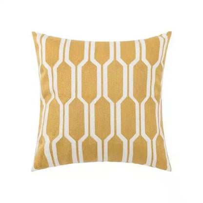 Mustard yellow pillow cover with a white daisy floral geometric pattern for living room decor by decorbites
