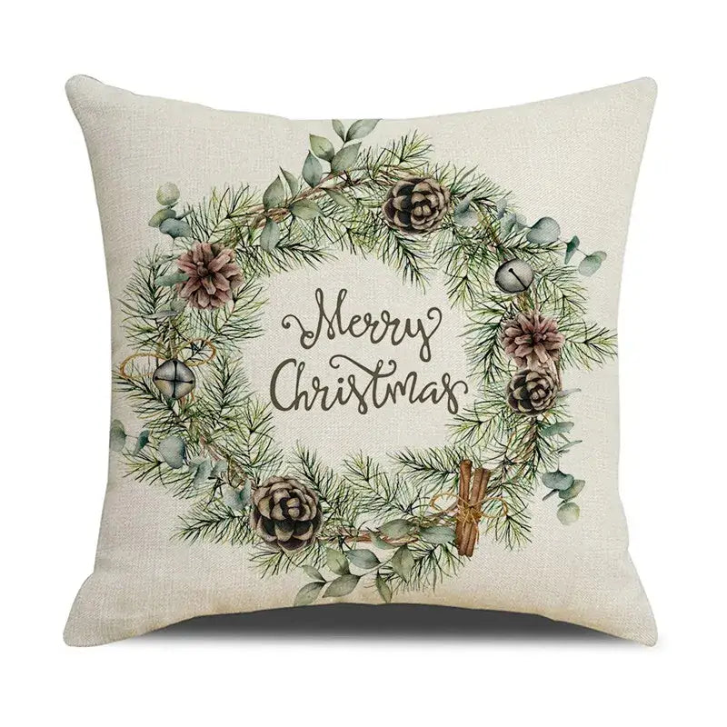 Beige linen throw pillow with festive wreath design featuring pine needles pinecones and silver bells decorbites cartoon birds christmas decor