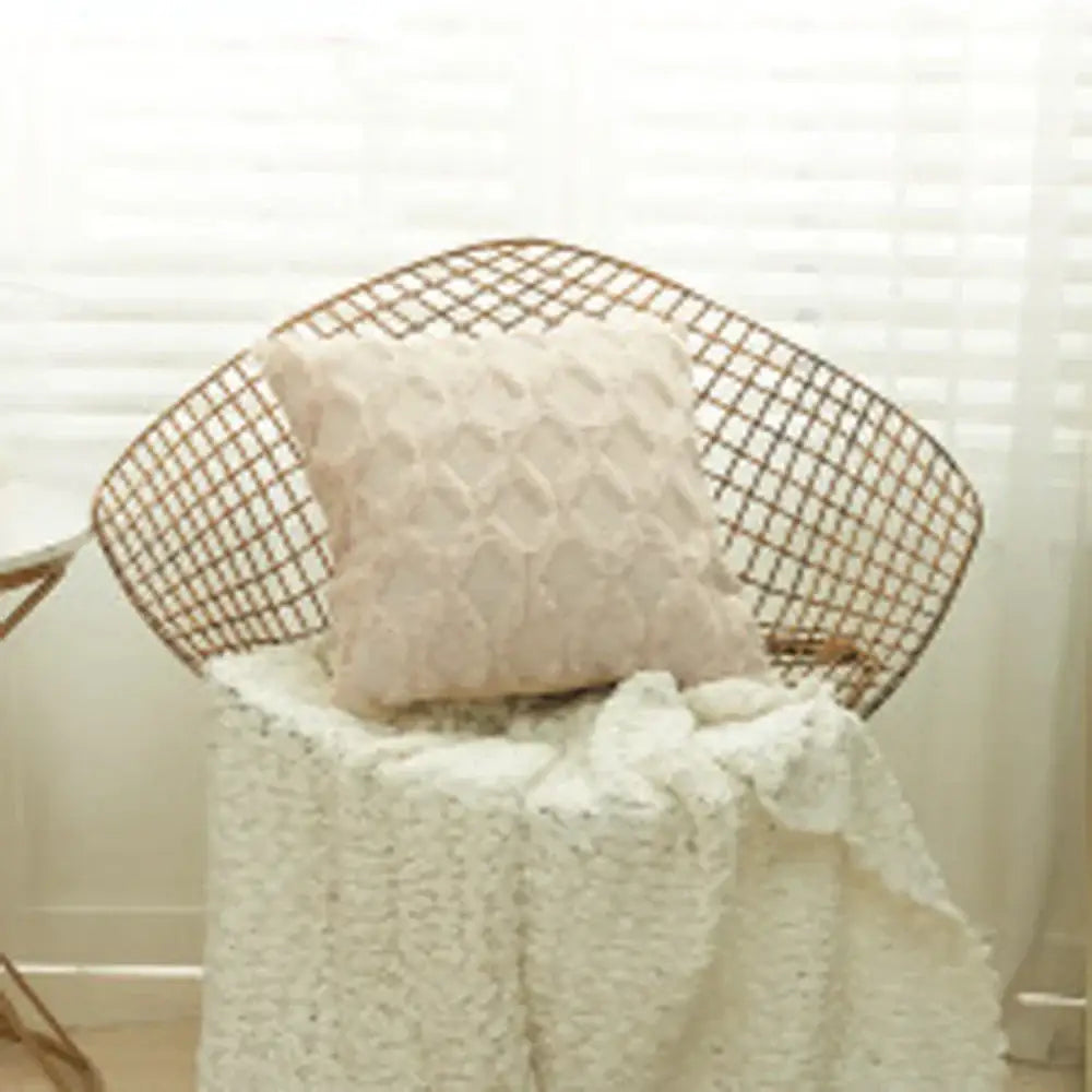 Cream-colored textured cushion cover with geometric diamond pattern ideal for living room decor