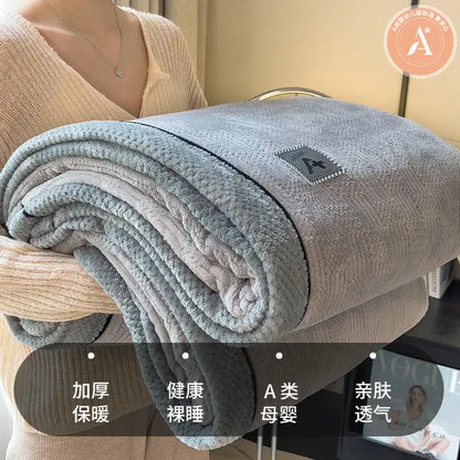 A soft gray velvet plush cotton blanket with cozy texture and subtle stitched border for bedroom luxury throw