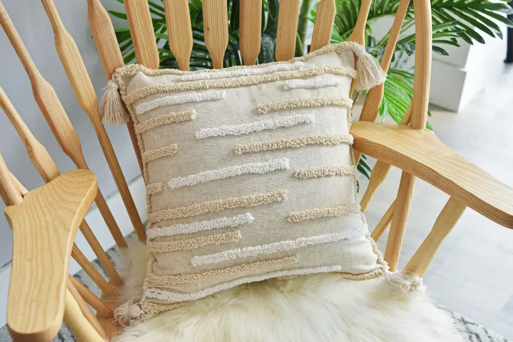 Beige handmade geometric tufted pillowcase set featuring textured throw pillow with cream woven stripes and tassels decorbites