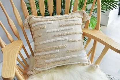Beige handmade geometric tufted pillowcase set featuring textured throw pillow with cream woven stripes and tassels decorbites