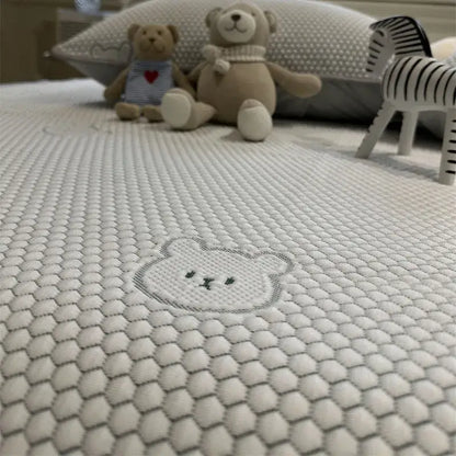 Beige honeycomb bear decorbites cooling ice bean sheet set featuring a white mattress with hexagonal texture and embroidered bear face