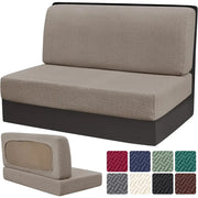 Beige jacquard woven rv sofa cover with a snug fit over dark frame protecting living room furniture
