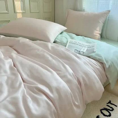 Soft pink satin duvet cover with subtle sheen and mint green bedsheet in decorbites ice silky solid bedding set