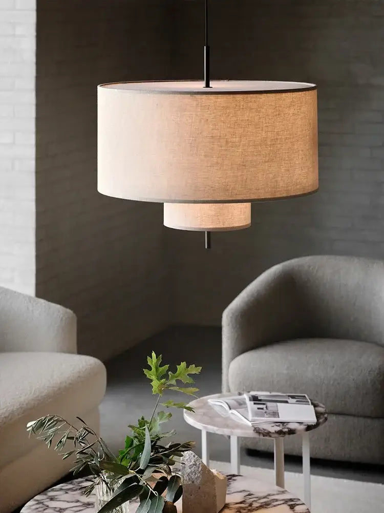 Beige linen handmade fabric chandelier with minimalist drum pendant and black metal hardware by decorbites handmade fabric