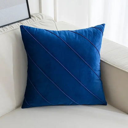 A rich royal blue velvet throw pillow with diagonal stitched accents for living room hand pleat embroidered cushions