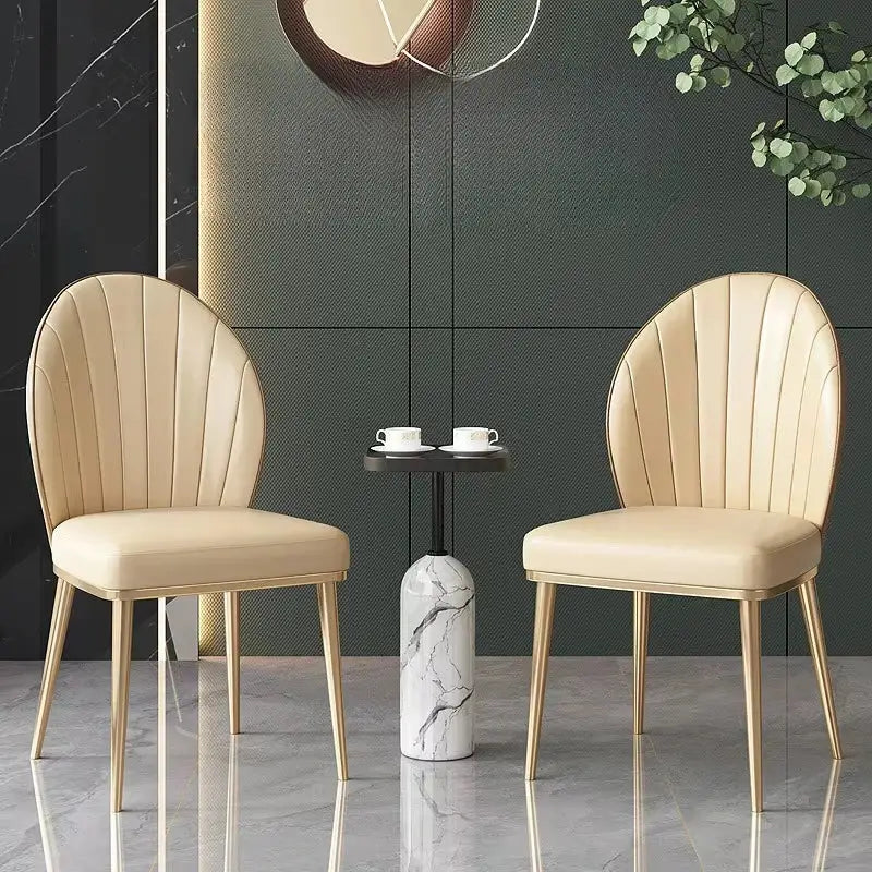 Beige pleated upholstered dining chairs with gold-tone metal legs from decorbites dining set for elegant dining room decor