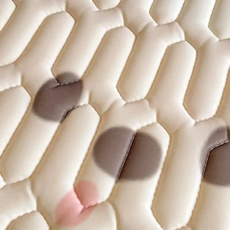 Beige and red cartoon pattern latex quilted bed sheets featuring a cream-colored pattern latex mattress with honeycomb design