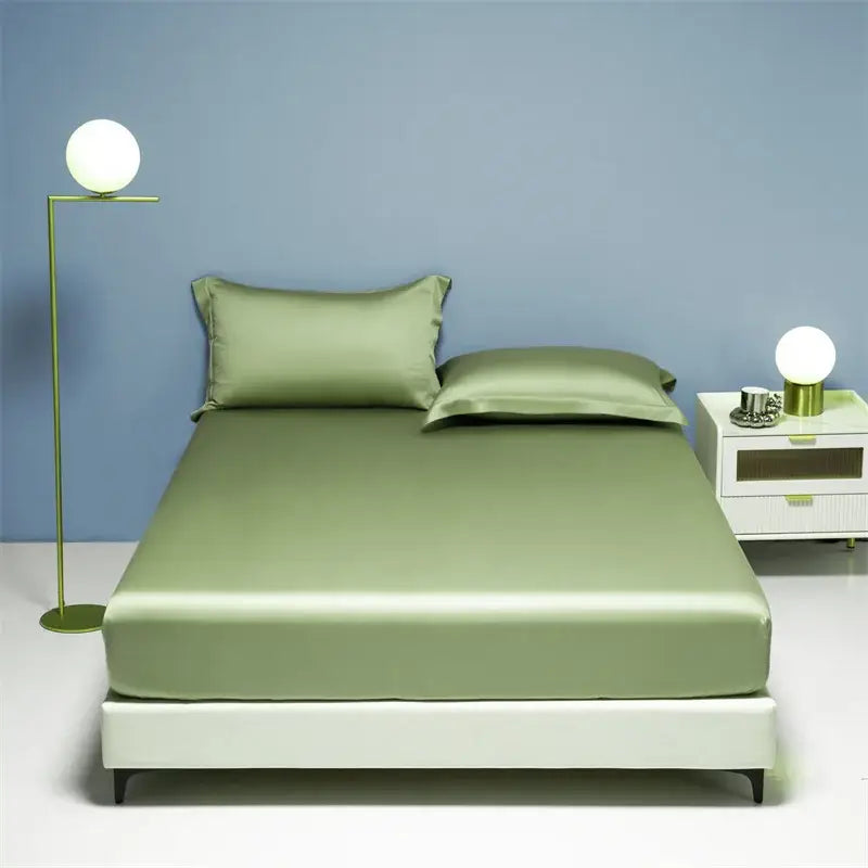 Satin green bed sheet set with matching pillowcases made of decorbites 1000tc egyptian cotton for fitted sheet use
