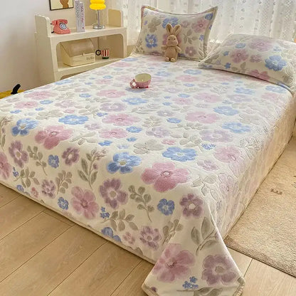 Beige space astronaut cartoon flannel blanket with cream fleece floral pattern featuring pink and blue blossoms decorbites cartoon flannel
