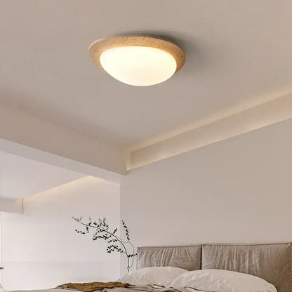 Beige speckled stone led ceiling light with warm diffused glow and natural stone outer ring for bedroom decorbites led ceiling