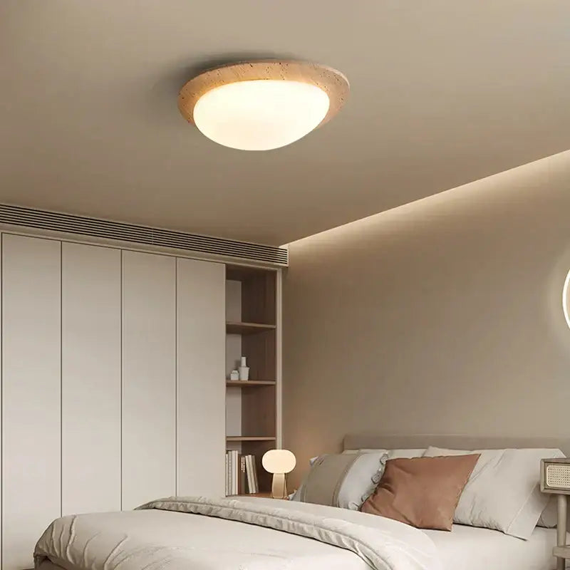 Beige speckled stone led ceiling light with warm diffused glow and natural wood-textured frame for bedroom decorbites led ceiling