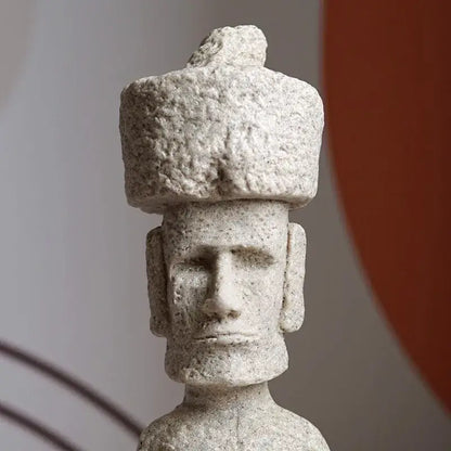 Beige stone easter island moai pukao statue with textured rounded hat and carved facial features for living room decor